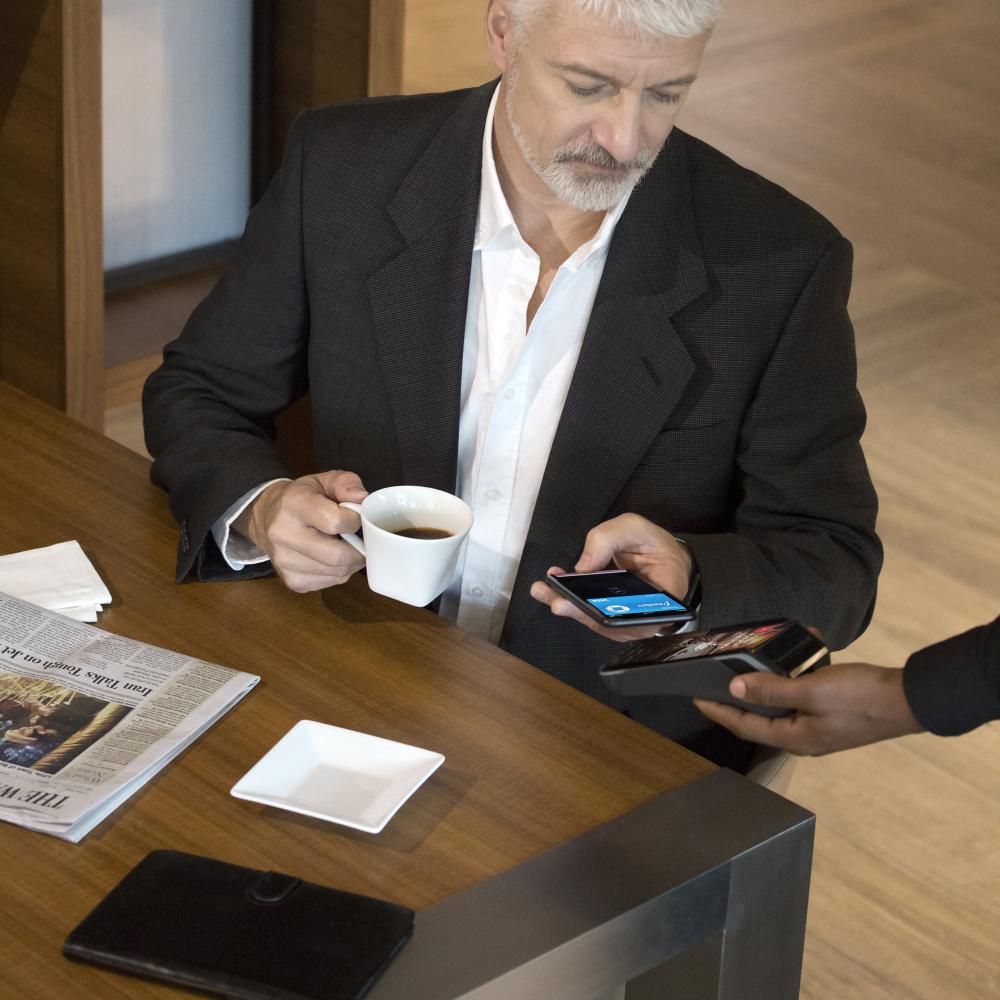Man paying at the table